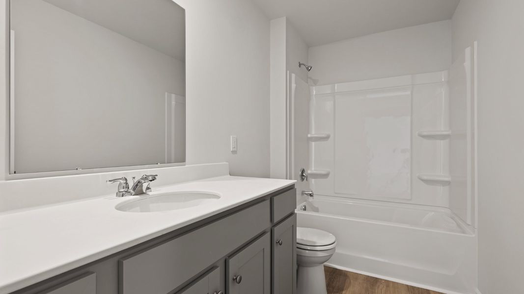 Representative furnished interior of a home built from the PENWELL by D.R. Horton in Carolina Groves, Moncks Corner (Image 11).