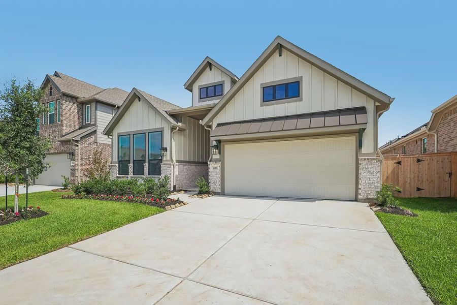 Representative exterior photo of a completed home built from the Lynnbrook by Chesmar Homes in Wood Leaf Reserve, Tomball, TX (Image 15). Representative exterior photo of a completed home built from the Lynnbrook by Chesmar Homes in Wood Leaf Reserve, Tomball, TX (Image 15).