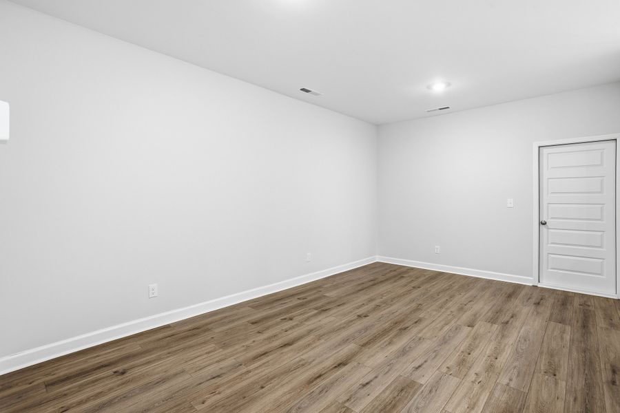 Spacious, unfurnished interior of a new home in Ovation at Sweetbrier, Durham (Image 24).