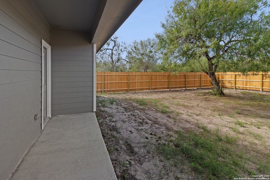 Exterior details and patio area of a home in , Beeville (Image 3).