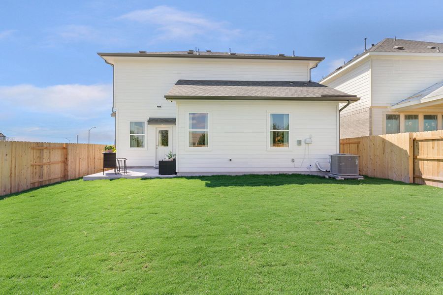 Front exterior of a new home in Briarwood, Elgin, TX, highlighting curb appeal (Image 26).