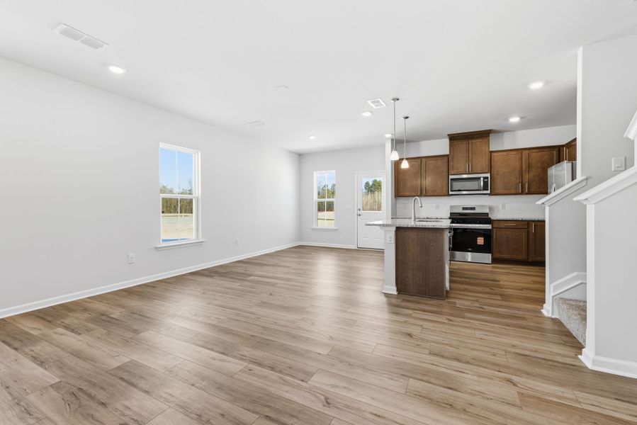 Spacious, unfurnished interior of a new home in Poets Walk, Whitsett (Image 22).
