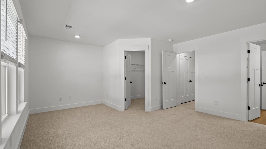 Accomplished design meets restful elegance in this exclusive primary suite by DRB Homes