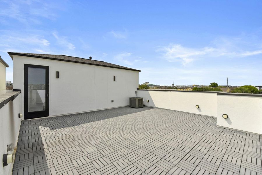 Exterior details and patio area of a home in , Houston (Image 4). Exterior details and patio area of a home in , Houston (Image 4).