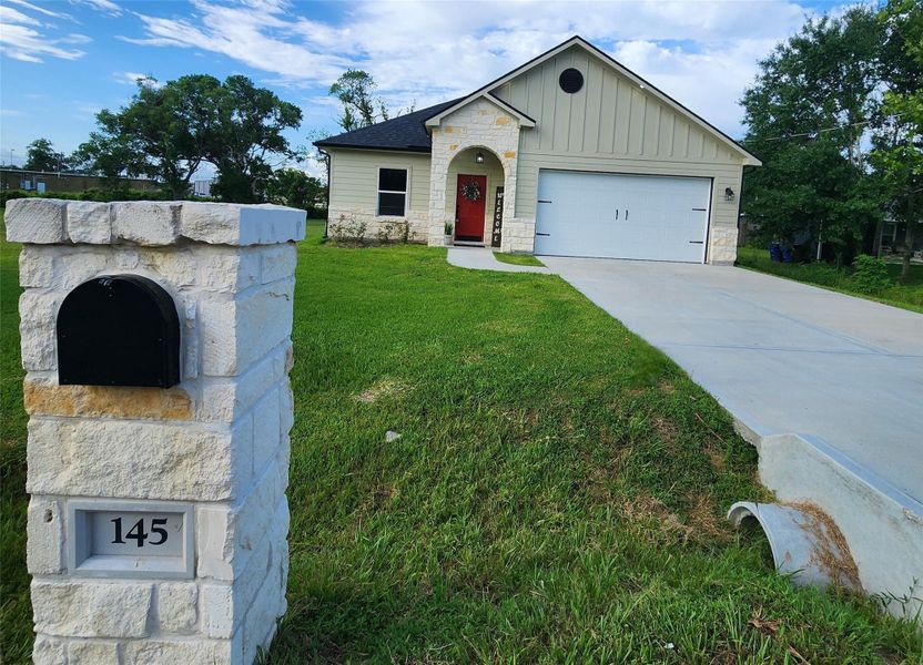 Front exterior of a new home in , West Columbia, TX, highlighting curb appeal (Image 13).