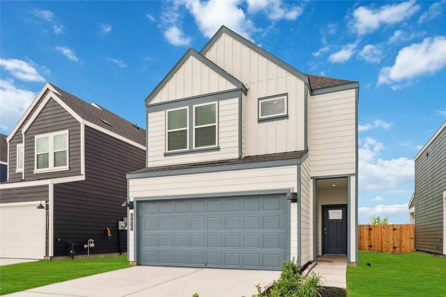 Front exterior of a new home in Legacy Village, Houston, TX, highlighting curb appeal (Image 2). Front exterior of a new home in Legacy Village, Houston, TX, highlighting curb appeal (Image 2).