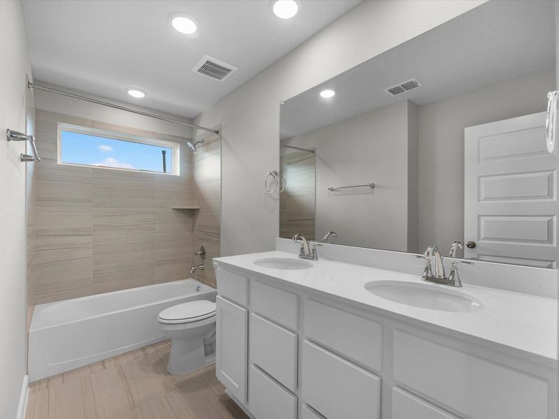 Furnished interior view inside a new home in Mason Woods, Cypress (Image 4).