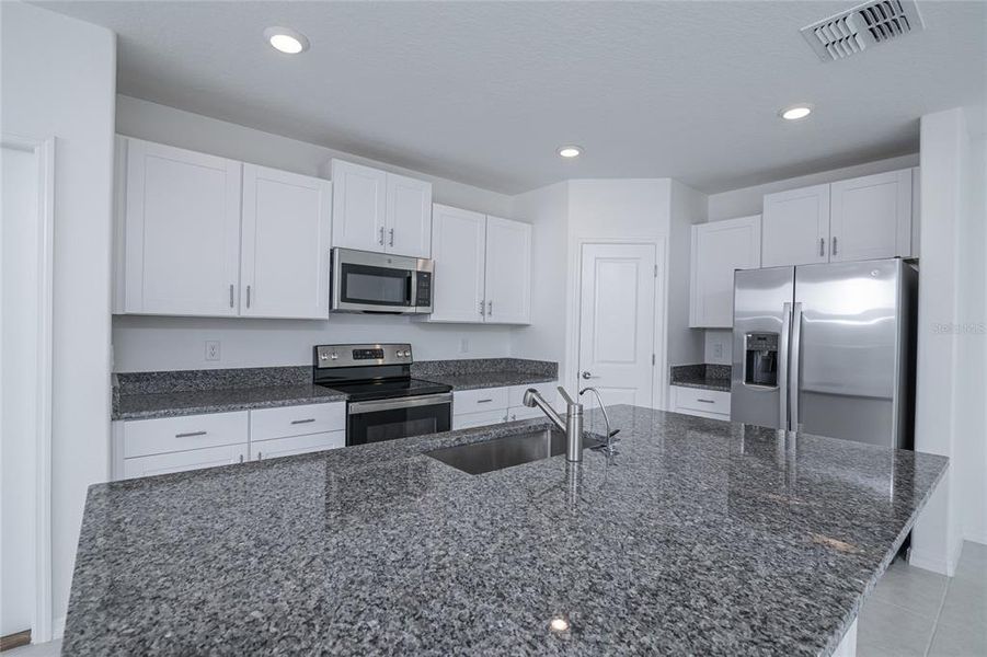 Furnished interior view inside a new home in Saddle Creek Preserve: The Manors II, Lakeland (Image 15).