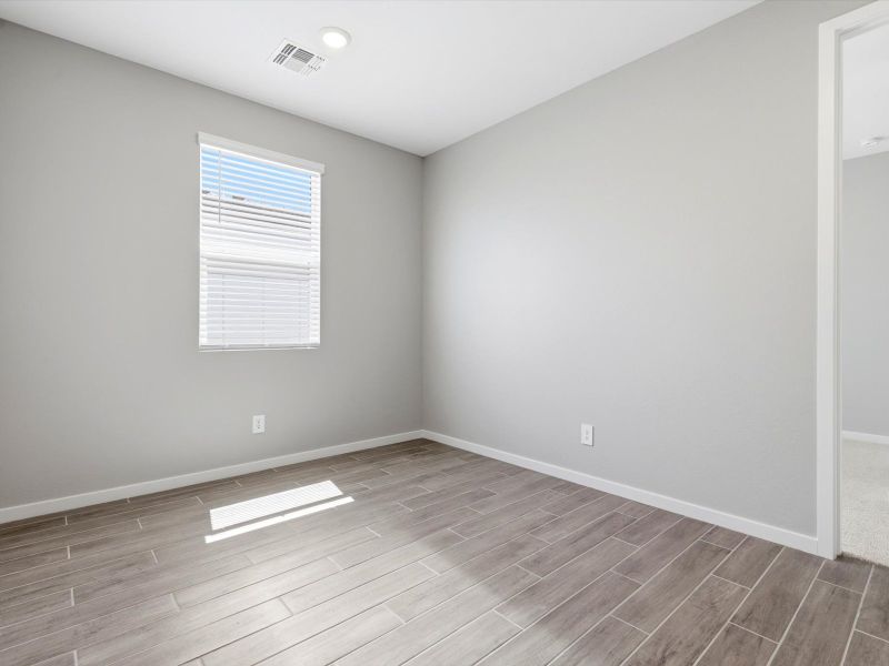 Spacious, unfurnished interior of a new home in White Tank Foothills Reserve Series, Waddell (Image 21). Spacious, unfurnished interior of a new home in White Tank Foothills Reserve Series, Waddell (Image 21).