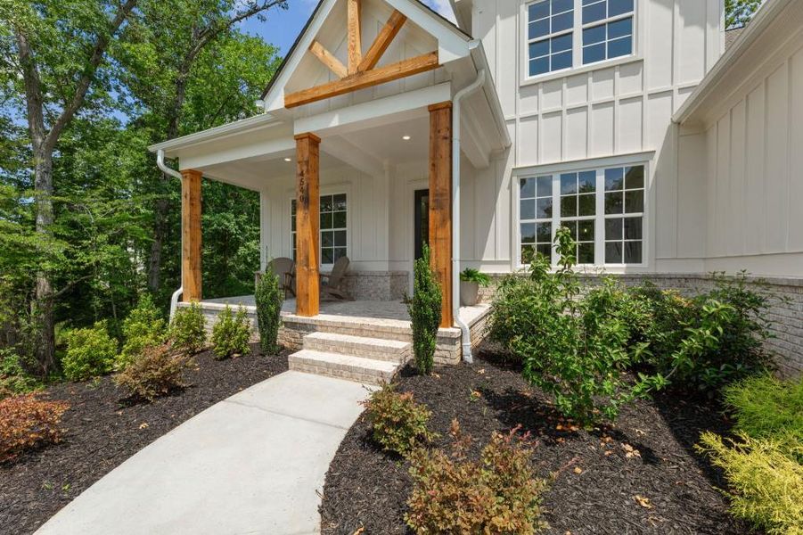 Exterior details and patio area of a home in Arden on Lanier, Cumming (Image 26).
