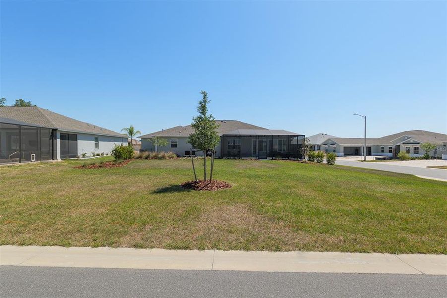 Front exterior of a new home in , Ocala, FL, highlighting curb appeal (Image 25). Front exterior of a new home in , Ocala, FL, highlighting curb appeal (Image 25).