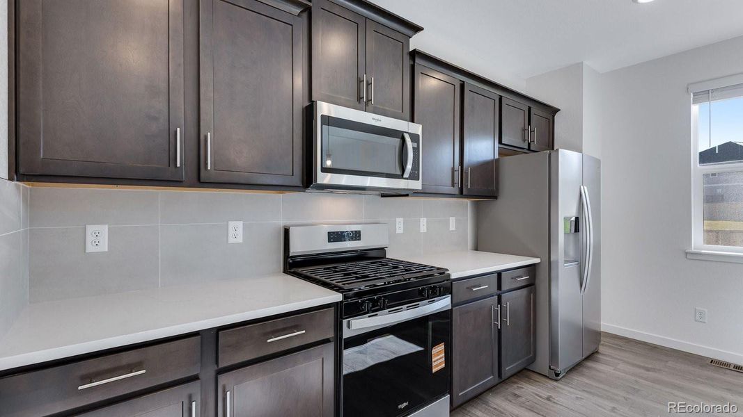 Furnished interior view inside a new home in Spring Valley Ranch, Elizabeth (Image 14).