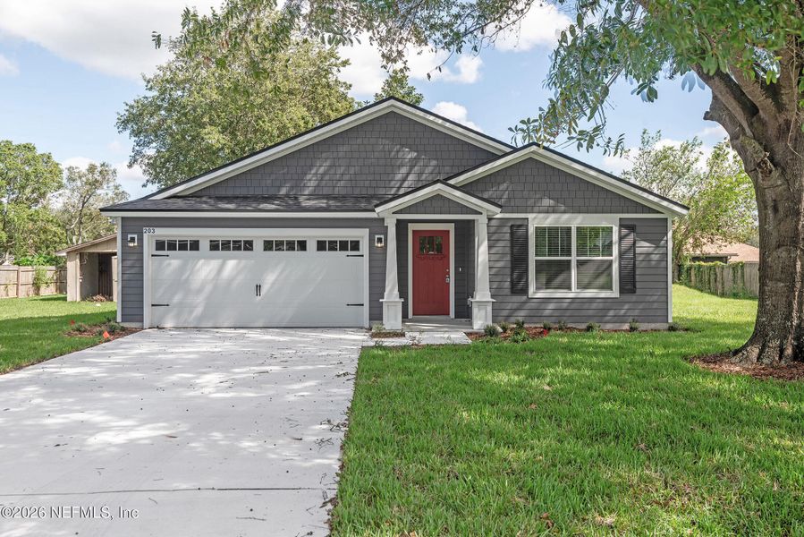 Front exterior of a new home in , Jacksonville, FL, highlighting curb appeal (Image 1). Front exterior of a new home in , Jacksonville, FL, highlighting curb appeal (Image 1).