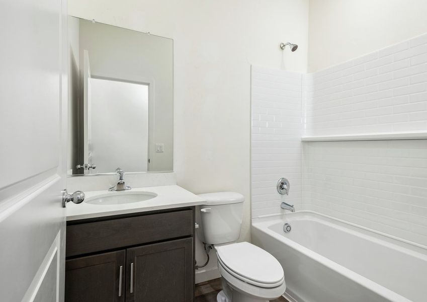 Secondary bathrooms provide space for guests to get ready.