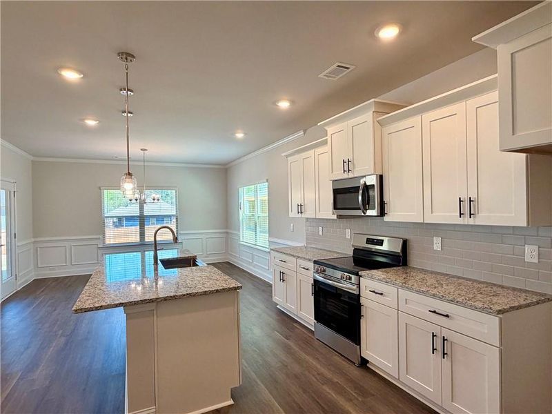 Furnished interior view inside a new home in Magnolia Villas, Cornelia (Image 5).