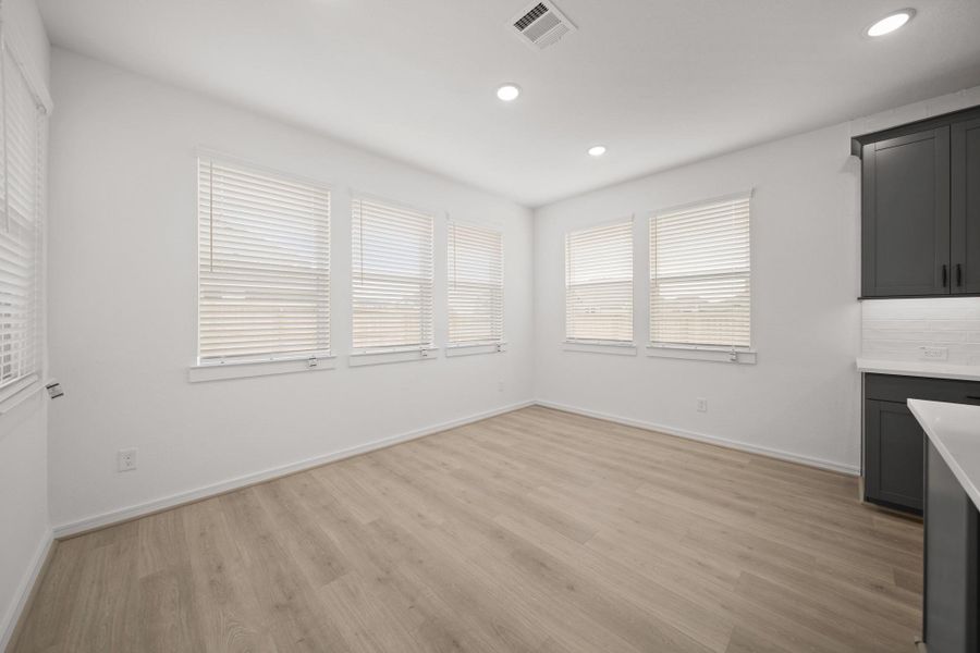 Sun-lit dining area (*Photo not of actual home and used for illustration purposes only.)