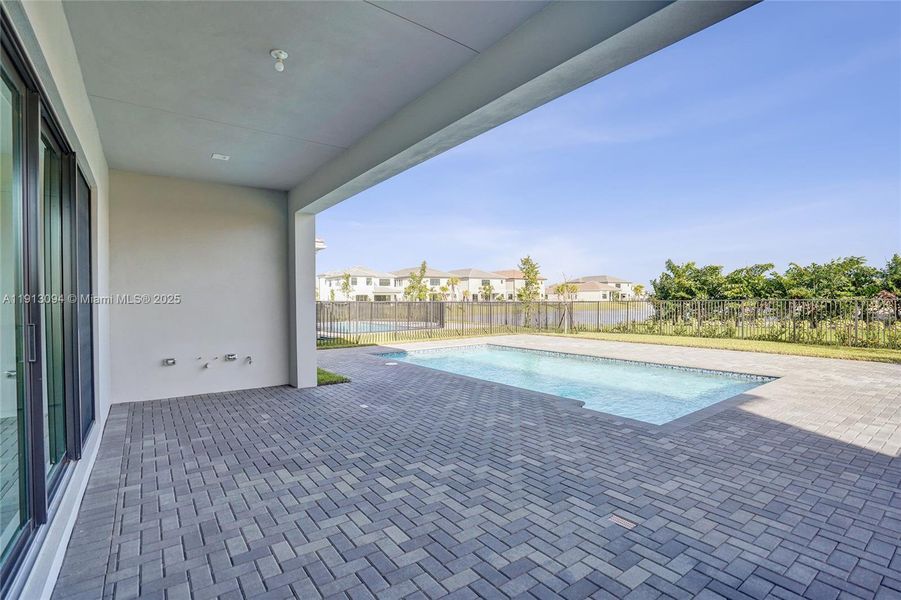 Exterior details and patio area of a home in Apex at Avenir, Palm Beach Gardens (Image 32).