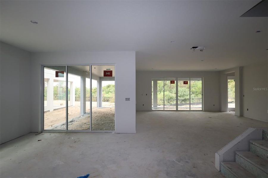 In-progress construction of a new home in Lake Star at Ovation, Winter Garden, FL (Image 15).