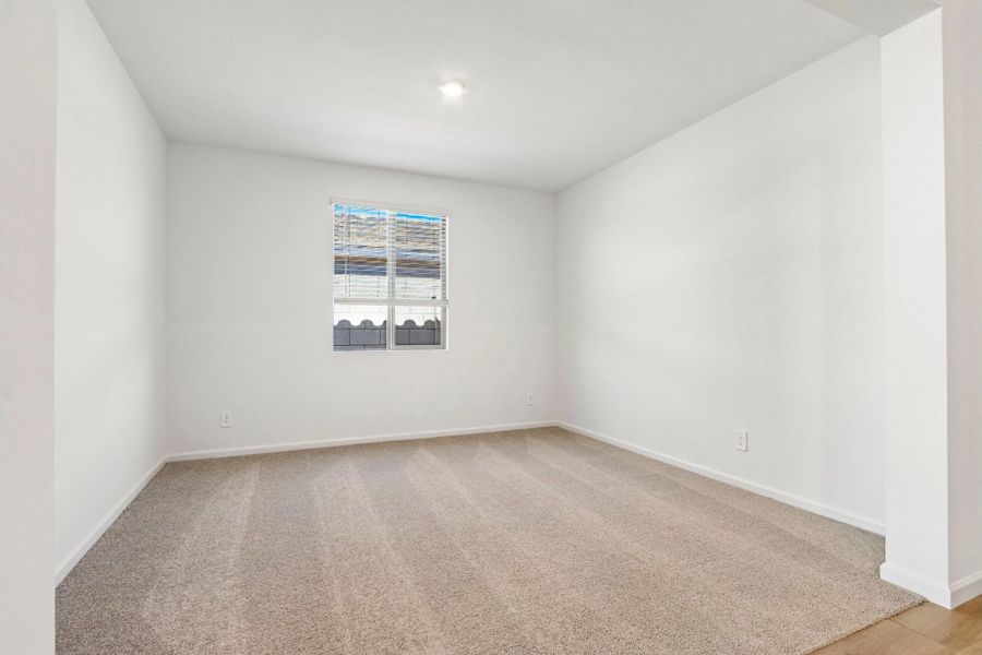 Spacious, unfurnished interior of a new home in Stonebridge Manor, Waddell (Image 10).