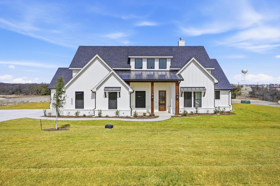 Front exterior of a new home in Aledo Heights - Aledo ISD, Annetta, TX, highlighting curb appeal (Image 25).