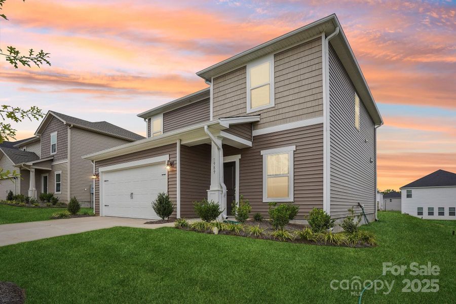 Front exterior of a new home in Harper Landing, Stanley, NC, highlighting curb appeal (Image 21).