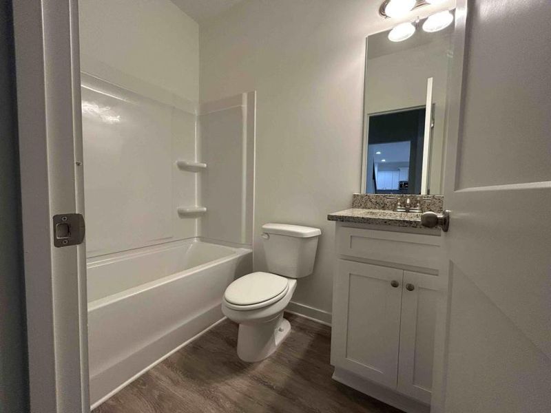 Furnished interior view inside a new home in Sutton's Landing, Statham (Image 6).