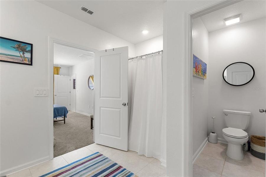 Furnished interior view inside a new home in Lawson Dunes: Estate Collection, Haines City (Image 17).
