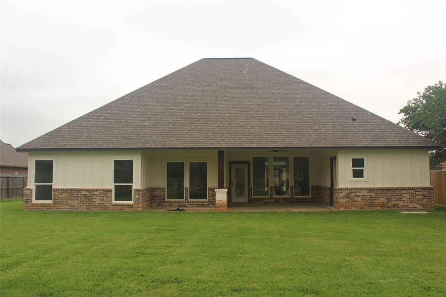 Exterior details and patio area of a home in , Clute (Image 24).