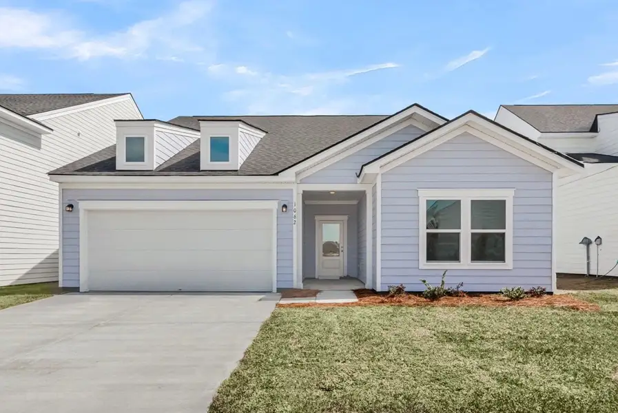Representative exterior photo of a completed home built from the McKinley by Ashton Woods in Tea Farm, Ravenel, SC (Image 1). Representative exterior photo of a completed home built from the McKinley by Ashton Woods in Tea Farm, Ravenel, SC (Image 1).