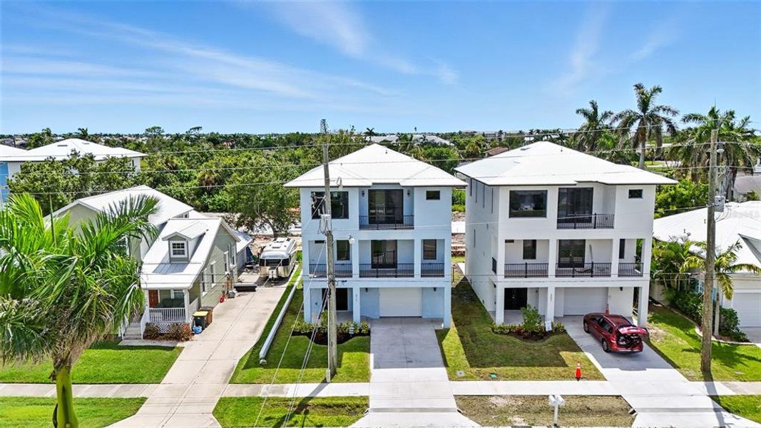 Front exterior of a new home in , Punta Gorda, FL, highlighting curb appeal (Image 22).