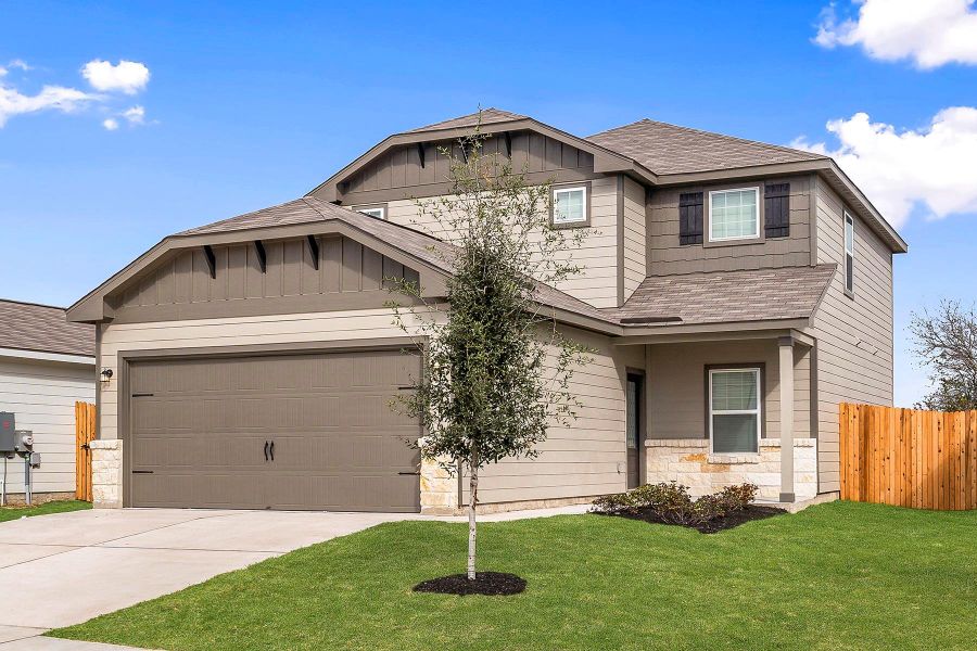 Front exterior of a new home in , Elgin, TX, highlighting curb appeal (Image 1).