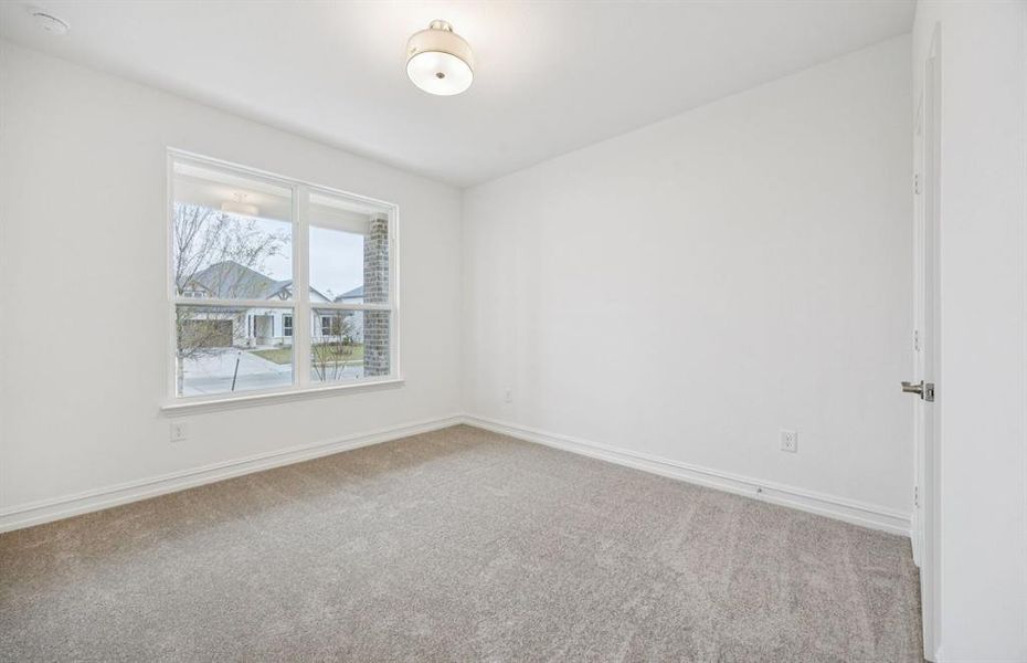 Secondary bedroom designed for comfort and convenience