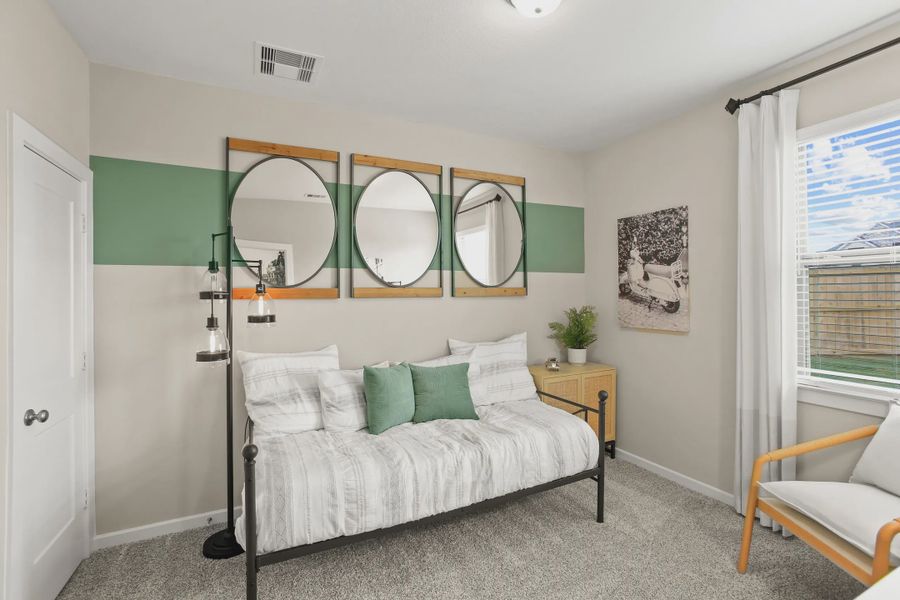 Representative furnished interior of a home built from the Summerhouse 2 by Chesmar Homes in Meridiana Townhomes, Iowa Colony (Image 13).