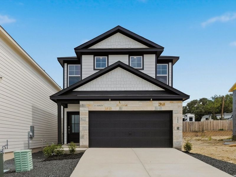 Front exterior of a new home in Meadows at Oak Creek, San Antonio, TX, highlighting curb appeal (Image 2). Front exterior of a new home in Meadows at Oak Creek, San Antonio, TX, highlighting curb appeal (Image 2).