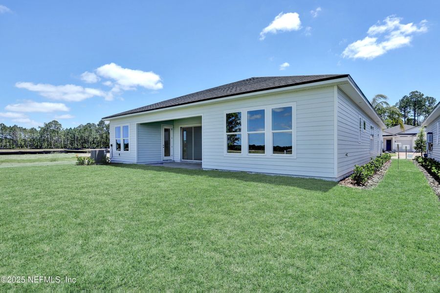 Exterior details and patio area of a home in Reverie at TrailMark, St. Augustine (Image 1). Exterior details and patio area of a home in Reverie at TrailMark, St. Augustine (Image 1).