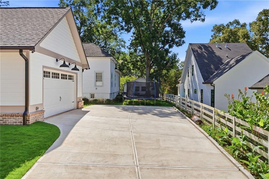 Front exterior of a new home in , Ball Ground, GA, highlighting curb appeal (Image 33).