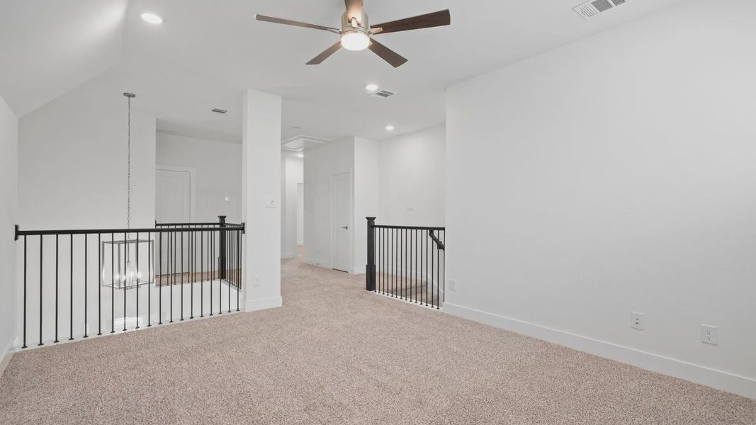 Spacious, unfurnished interior of a new home in Lakes of Cane Island, Katy (Image 22).