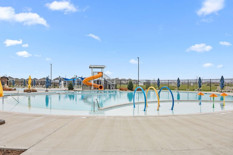 Sunterra’s resort-style lagoon features expansive swimming areas, water slides, and shaded seating for residents to enjoy year-round.