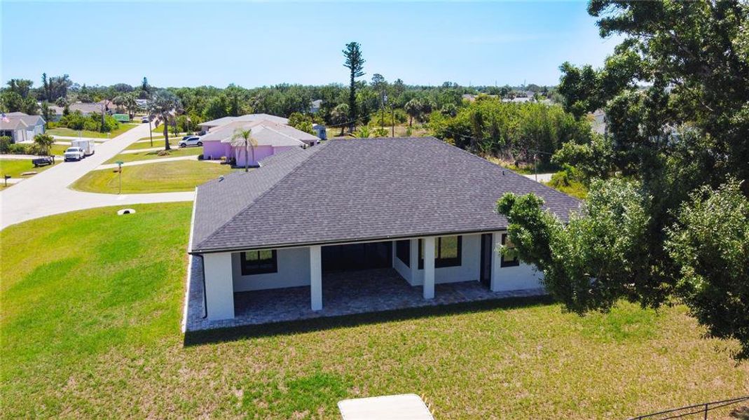 Front exterior of a new home in , Englewood, FL, highlighting curb appeal (Image 11).