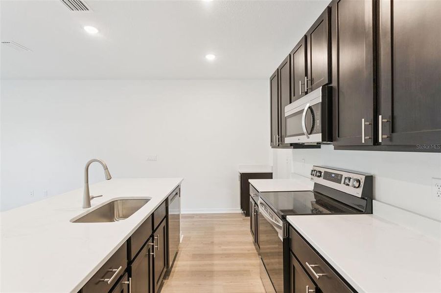 Furnished interior view inside a new home in Connors Cove, Eustis (Image 4).