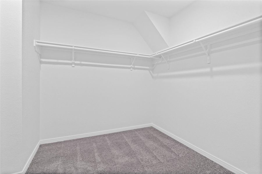 Look at this immaculate closet! With high shelving, multiple rows to hang clothing, you are sure to have enough room for all your belongings!