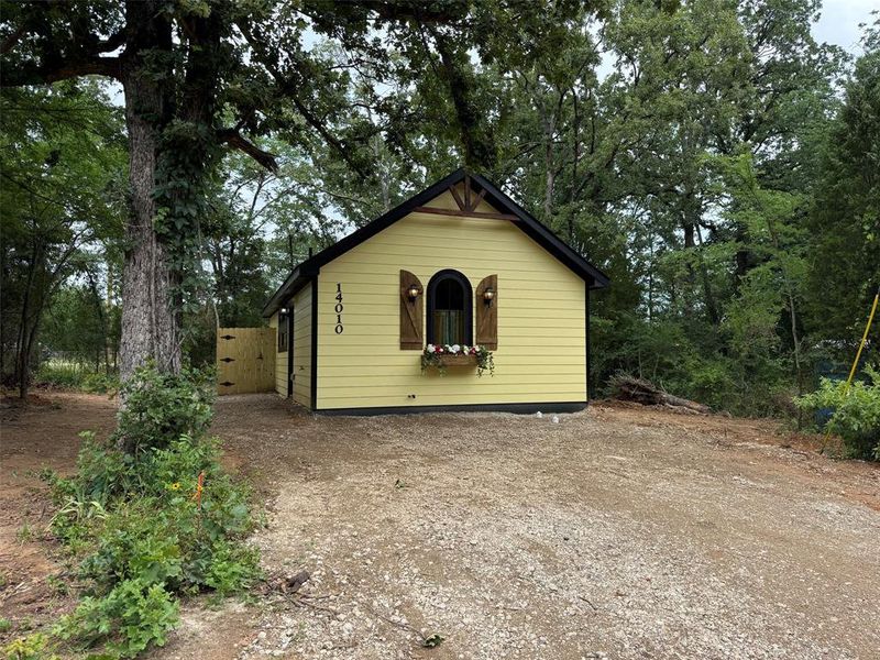 Exterior details and patio area of a home in , Log Cabin (Image 13).