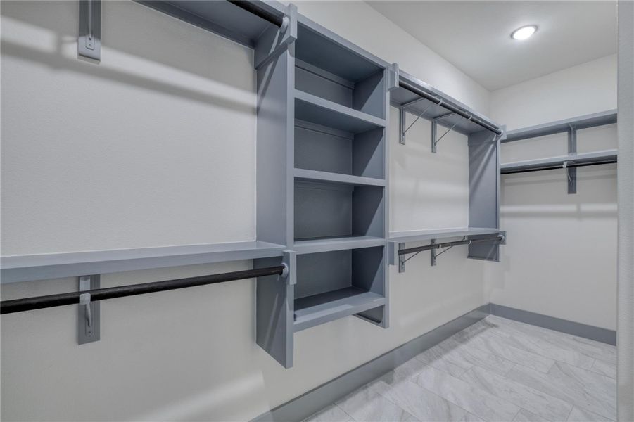 Large walk-in primary closet Large walk-in primary closet