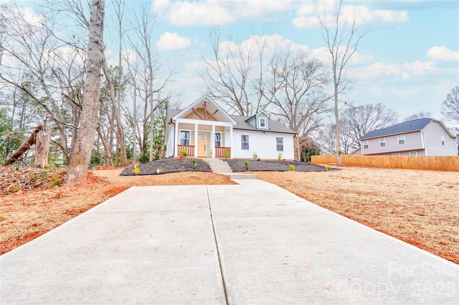 Front exterior of a new home in , Shelby, NC, highlighting curb appeal (Image 19). Front exterior of a new home in , Shelby, NC, highlighting curb appeal (Image 19).