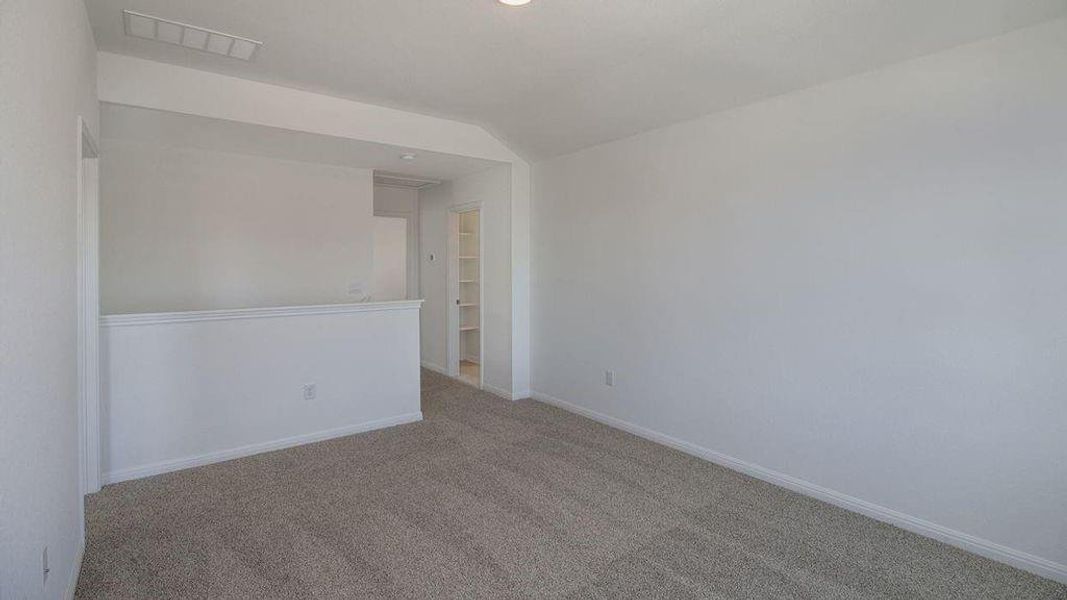Spacious, unfurnished interior of a new home in Caldwell Crossing, Iowa Colony (Image 7).