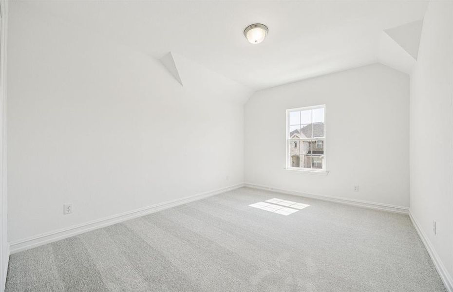 Spacious secondary bedroom with large windows Spacious secondary bedroom with large windows