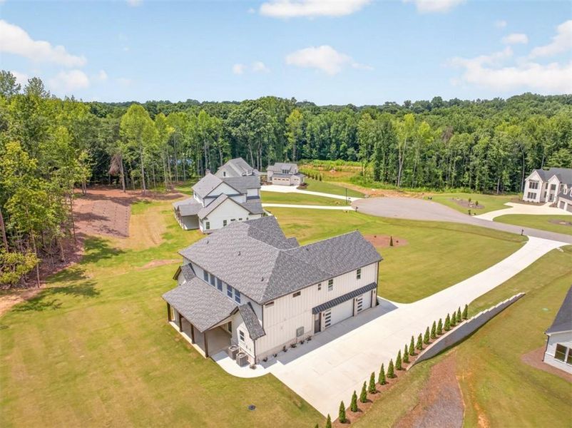 Front exterior of a new home in , Jefferson, GA, highlighting curb appeal (Image 28).