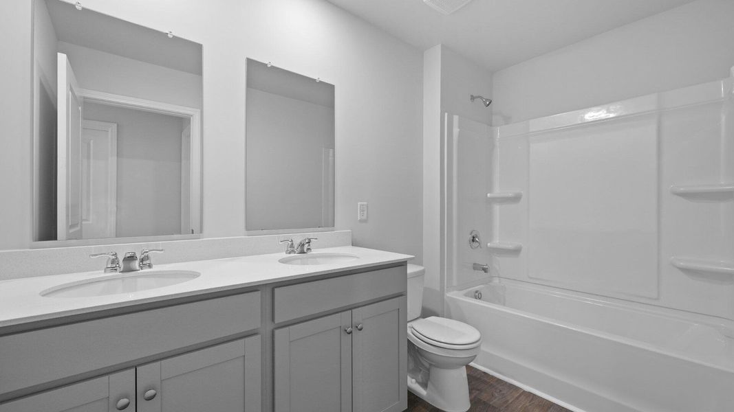 Furnished interior view inside a new home in Pine Hills at Cane Bay, Summerville (Image 10).