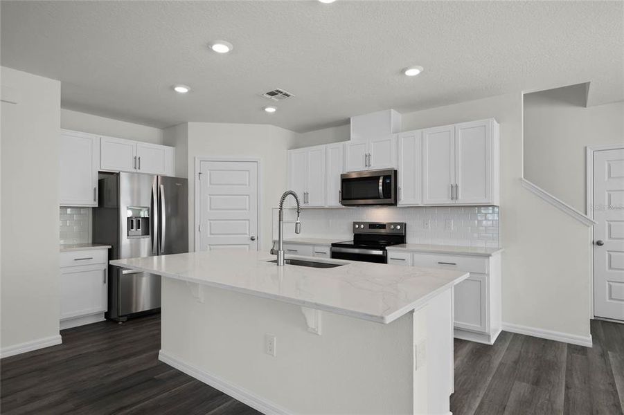 Furnished interior view inside a new home in Harmony at Lake Eloise, Winter Haven (Image 5). Furnished interior view inside a new home in Harmony at Lake Eloise, Winter Haven (Image 5).