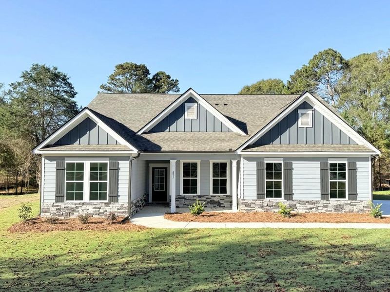 Front exterior of a new home in Westlyn, Winder, GA, highlighting curb appeal (Image 1).